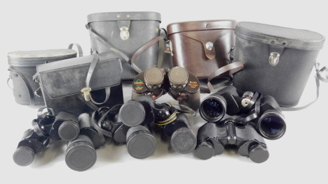 A collection of pairs of binoculars