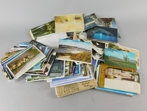 A large quantity of loose postcards etc.