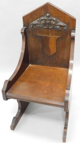 A Victorian oak ecclesiastical style throne type chair