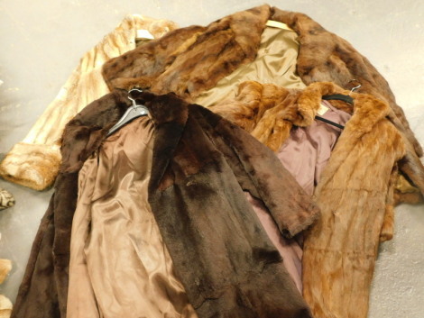 Four various fur coats