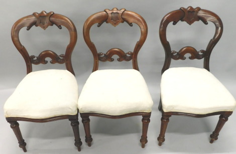 A set of three Victorian mahogany balloon back chairs