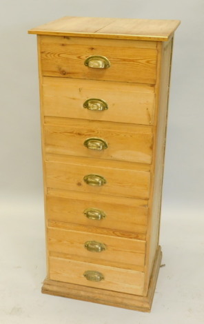 A narrow pine chest