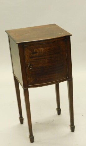 A mahogany bedside cabinet