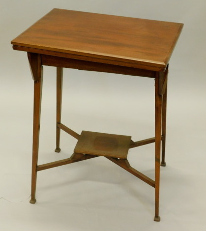 An Edwardian mahogany card table