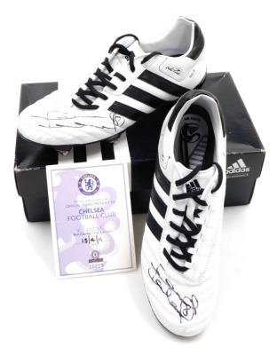 A pair of black and white Adidas football boots signed by Frank Lampard, signed in black pen to each boot along with the number 8, the left boot marked Isla 8 and the left Luna 8, boxed, together with a Chelsea Football Club authenticity certificate signe