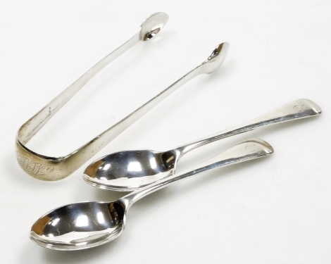 A pair of George III silver sugar tongs, of plain form, London 1811, and a pair of Edward VII Old English pattern teaspoons, engraved with the letter E to handle, 2.35oz.