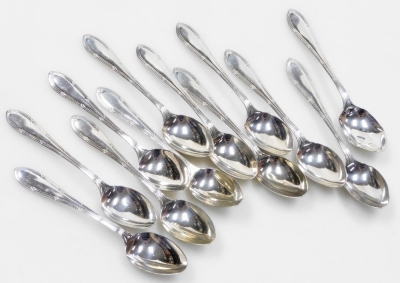 A set of twelve silver coffee spoons, with line and raised clover decoration to each handle, Sheffield 1901, 5.13oz.