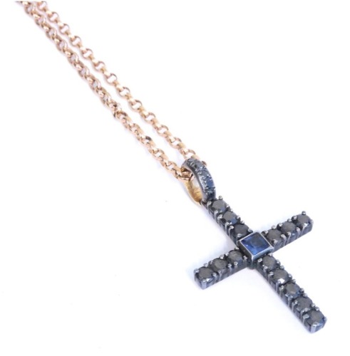 A De Grisogono black diamond and sapphire cross, set in 18ct gold and silver, on a 9ct gold belcher link neck chain, on a bolt ring clasp, 11.2g all in.