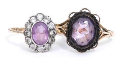 An amethyst and white sapphire ring, set in yellow metal, stamped 9ct, size Q/R, oval cut amethyst ring, set in yellow metal, stamped 9ct, size Q, 5.0g all in.