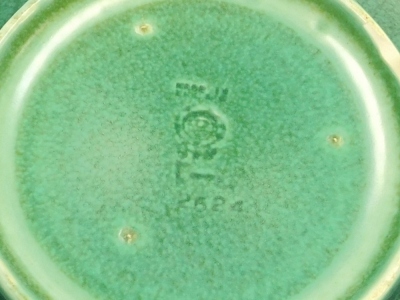 A Pilkington Royal Lancastrian pottery bowl, in a mottled green glaze, impressed marks and numbered 2524, 23cm diameter. - 2