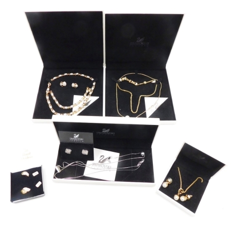 Swarovski jewellery, including an earring and pendant necklace set, two further similar sets, two further necklaces and two pairs of earrings, some boxed. (a quantity)