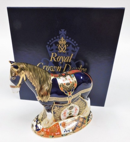 A Royal Crown Derby porcelain Shire Horse paperweight, limited edition number 554/1500, specially commissioned for Sinclair's, red printed marks and gold stopper, 19cm high, boxed with certificate.