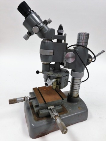 A Leitz model number 2459 electric engineer's microscope.