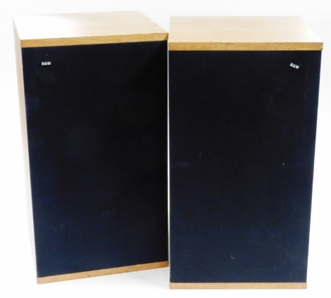 A pair of B&W teak cased speakers , 64cm high.