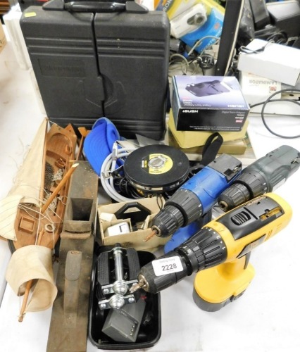 A quantity of cordless power drills, treen model of a ship, wooden block plane, etc. (a quantity) Buyer Note: WARNING! This lot contains untested or unsafe electrical items. It is supplied for scrap or reconditioning only. TRADE ONLY