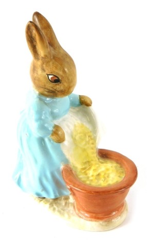 A Beatrix Potter figure Cecily Parsley, gold oval mark beneath, 8cm high. (AF)