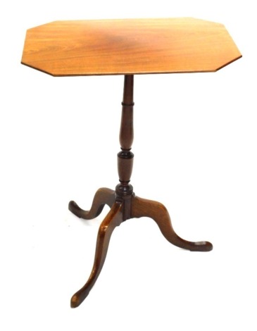 A 19thC mahogany tilt top table, the rectangular top with canted corners, on a turned column and tripod base, 69cm high, 54cm wide.