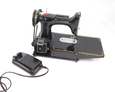 A Singer electric sewing machine, 222K, with pedal attachment and threads, boxed. (AF) WARNING! This lot contains untested or unsafe electrical items. It is supplied for scrap or re-conditioning only. TRADE ONLY - 2