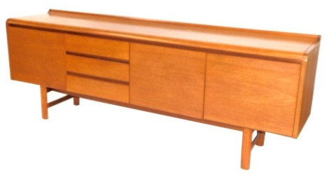A teak sideboard, with arrangement of three cupboard doors and three drawers on H frame base, 73cm high, 208cm wide, 46cm deep.