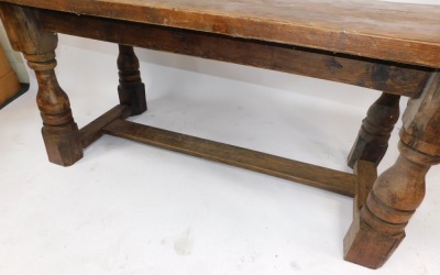 An oak refectory table, with planked top on H frame base, 76cm high, 194cm wide, 88cm deep. - 3