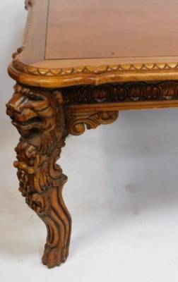 An elaborately carved hardwood dining table, with fluted and moulded border and lion mask and claw legs, 79cm high, 207cm wide, 118cm deep. - 3