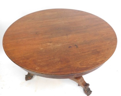 A 19thC mahogany dining table, the circular top on tripod base with acorn finial column, on claw feet, 77cm high, 114cm diameter. (AF) - 2