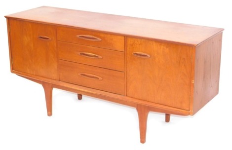 A teak sideboard, with arrangement of two doors and three drawers, on tapered legs, 73cm high, 151cm wide, 45cm deep.