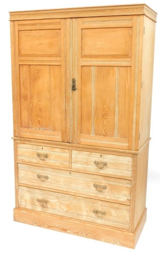 A Victorian blond ash linen press, the top doors above arrangement of three drawers on plinth base, previously painted, 196cm high, 120cm wide, 55cm deep.