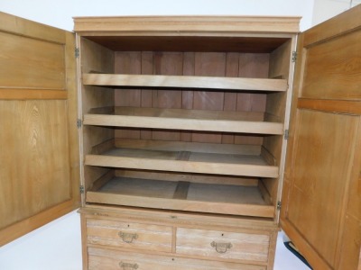 A Victorian blond ash linen press, the top doors above arrangement of three drawers on plinth base, previously painted, 196cm high, 120cm wide, 55cm deep. - 4