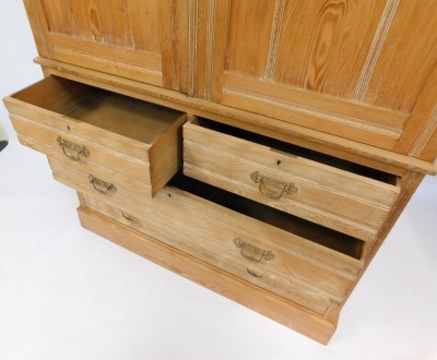 A Victorian blond ash linen press, the top doors above arrangement of three drawers on plinth base, previously painted, 196cm high, 120cm wide, 55cm deep. - 5