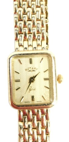 A 9ct gold Rotary ladies wristwatch, with rectangular watch head, on a four row strap, 19.9g all in.