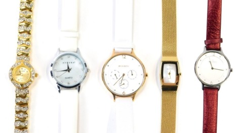 A group of lady's wristwatches, to include a Skagen chronograph on white leather strap, a Skagen stainless and red material strapped bracelet, a Skagen gold plated and mother of pearl dial wristwatch, an Aurora lady's wristwatch and a Paulo Fude wristwatc