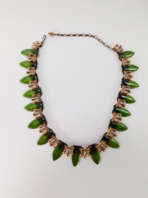 Two items of Matisse enamel jewellery, comprising a brass and green enamel leaf graduated necklace, 36cm long, and a two strand leaf brooch, 8cm high. (2) - 4