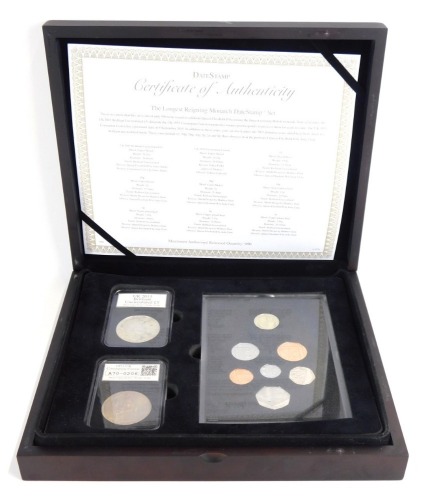 A Royal Mint Longest Reigning Monarch Datestamp set, with certificate of authenticity, limited edition of 950, in presentation case., comprising 1953 UK Coronation crown, UK 2015 Brilliant uncirculated £5 coin and a coin set for the boxed year.