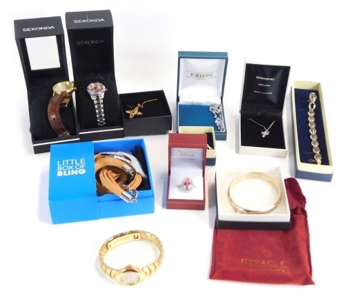 Various costume jewellery and effects, to include two Sekonda ladies wristwatches, silver dress ring, mystic topaz bracelet, silver crucifix pendant, etc. (1 tray)