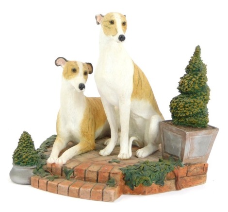 A Country Artist pair of greyhounds figure group, no. 1517, 18cm high, boxed.