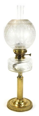 A 19thC brass oil lamp, with glass reservoir, Corinthian column support, with floral glass shade, 55cm high.