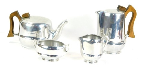 A set of four piece Picquotware tea and coffee service, comprising teapot, coffee pot, milk jug, and sugar bowl, the largest piece 19cm high.