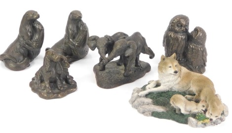 Five Menton Manor figure groups, comprising pair of owls, M18201, 12cm high, baby elephants, JS208, 9cm high, pair of dogs, 9cm high, two pairs of otters, M18202, 12cm high, and a Livingstone Wolf Shell game wolf figure group, 14cm high. (6)