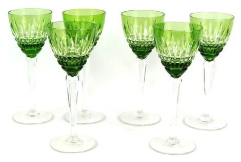 A set of six pressed glass goblet, each with a green glass top, on faceted stem, 21.5cm high.