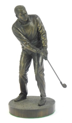 A Genesis (P S) limited edition cold cast figure of a golfer, numbered 6/2500, 24cm high.