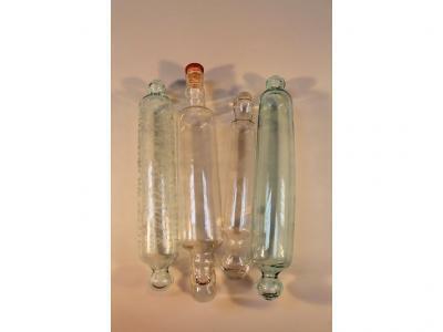 Four clear glass rolling pins