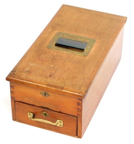 A mahogany and brass cash register, 19cm high, 25cm wide, 48cm deep.