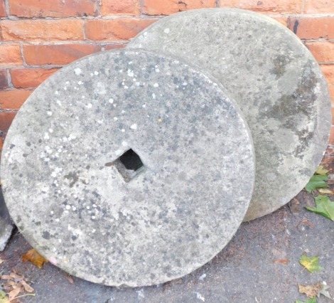 Two millstones, 65cm diameter.