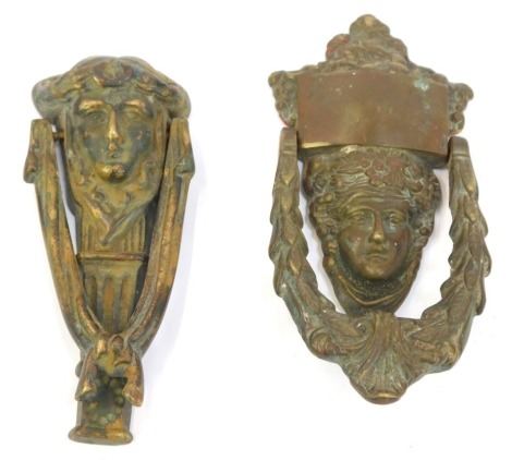 Two brass door knockers, each with Medussa mask handle and swag decoration, 20cm and 18cm high. (2)