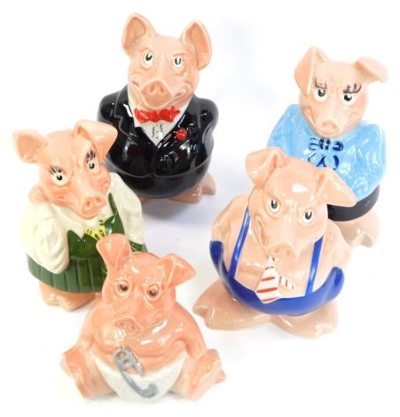 A set of five Wade Natwest piggy banks, comprising a family of father, mother, son, daughter and baby. (1 tray)