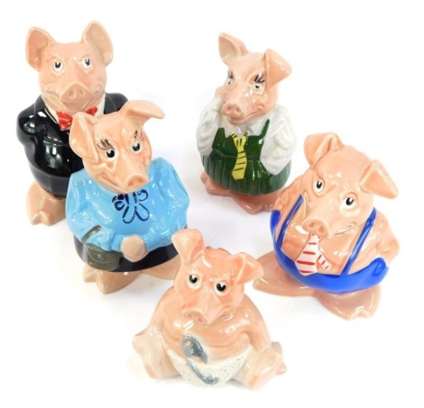 A set of five Wade Natwest piggy banks, comprising a family of father, mother, son, daughter and baby. (1 tray)