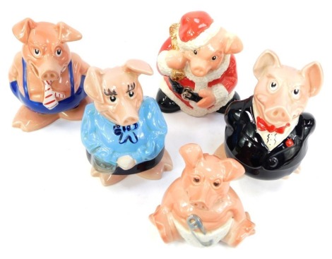 A set of five Wade Natwest piggy banks, comprising a family of father, mother, son, daughter and baby. (1 tray)