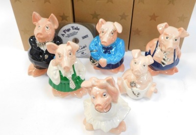 A set of Wade Natwest Silver Anniversary limited edition piggy banks, the 1982-2007 Silver Anniversary range limited edition no. 82/2500, comprising six figures, boxed, with a Pig's Tale DVD. (7) - 2