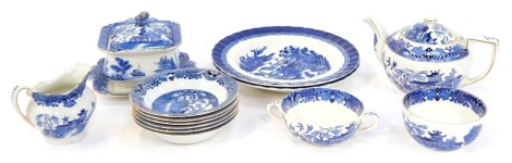 A group of Burleigh ware willow pattern blue and white wares, comprising two serving plates, teapot, breakfast cup, square tureen and tray, milk jug, sugar bowl and six bowls.